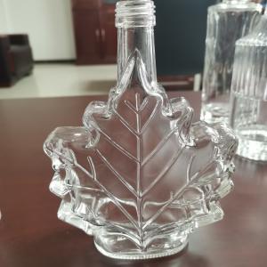 Wholesale Glass Collar 50ml Empty Maple Leaf Shaped Crew Top Glass Bottle 100ml Mini Glass Bottle from china suppliers