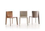 Doyl Hard Fiberglass Dining Chair Modern Simple Saddle Leather Casual
