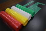 Plastic Disposable Aprons On A Roll White Blue Red Green Pink Yellow Black Color