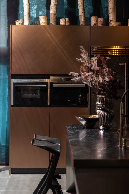 Rose Gold Modern Kitchen Cabinet With Geometric Lines And Stainless Steel Durability