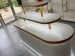 Creative Multi Level Acrylic Cosmetic Display Cabinet Oval Glowing Shop Display