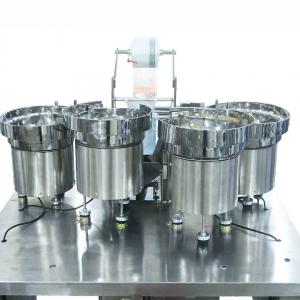 China Four Vibrator Bowl Automated Packaging Machine Four Tray Auto Packing Machine on sale
