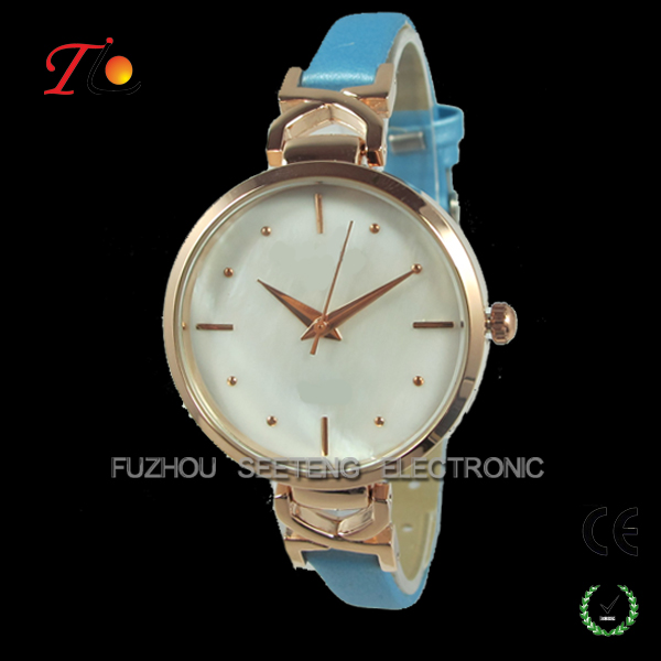 Beautiful thin gold color lady wrist watch with shell dial face