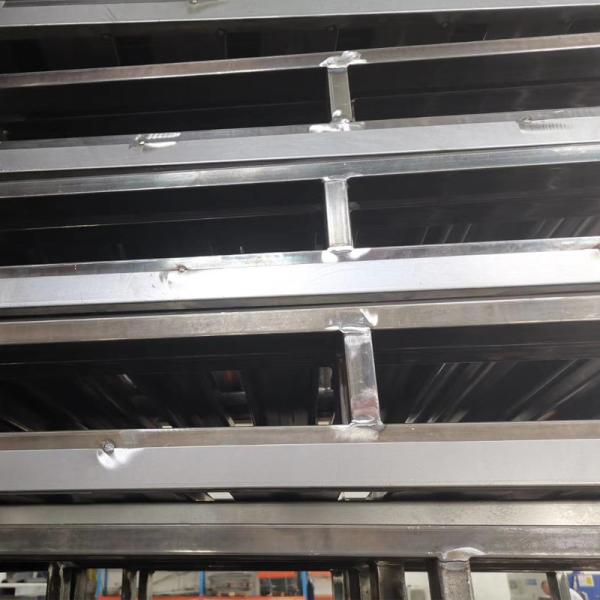 Heavy duty steel pallet in industrial setting