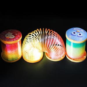Wholesale Children's colorful luminous plastic spring rainbow magic circle toy from china suppliers