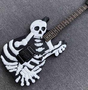 Wholesale Top Quality 6 Strings Bones Black Skull Electric Guitar from china suppliers