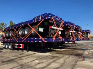 Wholesale Flat Bed Container Transport 4 Axle Flatbed Semi Trailer 16 Tires Not Self Dumping from china suppliers