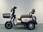 THE NEW SMALL ELECTRIC TRICYCLE BRINGS ITS OWN BABY TO THE HOME TO PICK UP