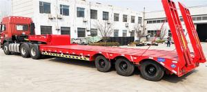China Steel Material 60T -70T Heavy Duty Semi Trailers Low Bed 3 Axles 12R22.5 / 12R20 Tire on sale