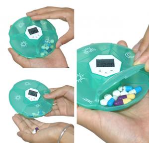 China High quality mini round plastic digital pill box travel capsule storage case medication reminder alarm reminding timer on sale