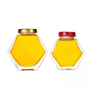 China Custom 230ml 350ml hexagon honey glass jar with Metal Lids and labels on sale