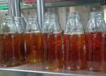 Professional Honey Volumetric Liquid Filling Machine Water Bottle Packing