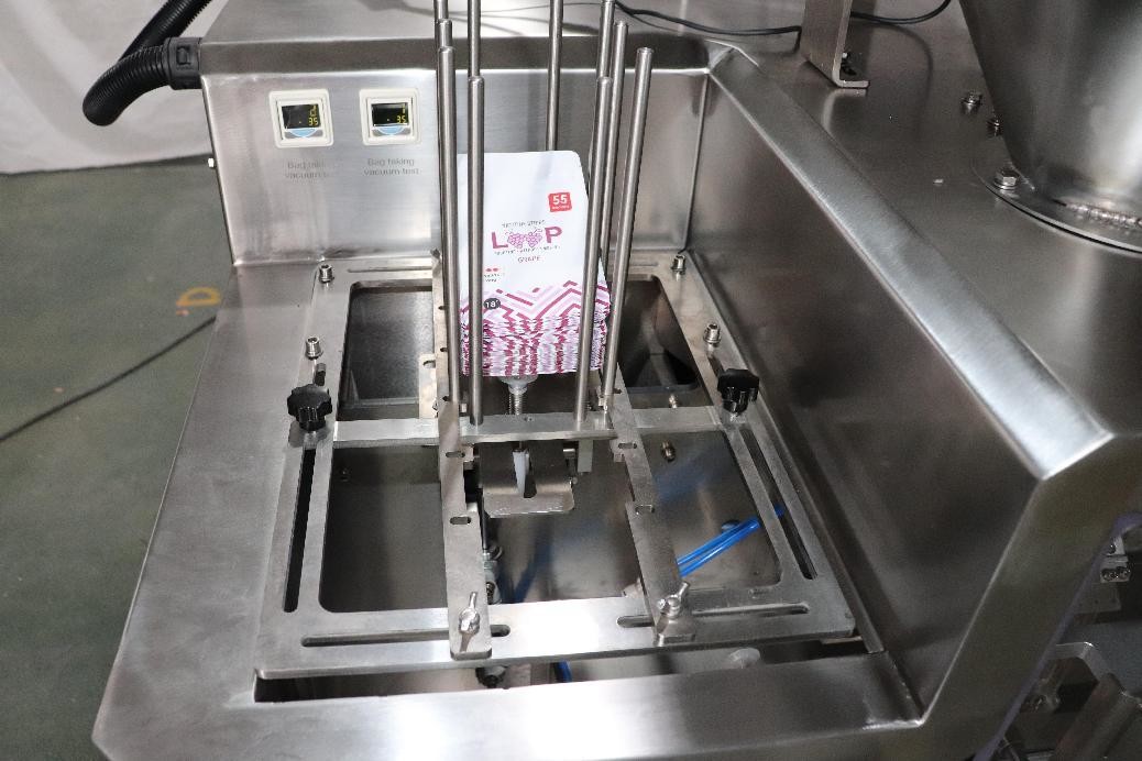 Automatic Small Premade Pouch Packing Machine For 3C Products Bucket Chain Filling Type