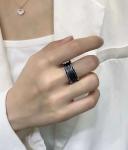 18K Gold Luxury Brand Jewelry Ring With Two 18 Kt White Gold Loops And A Black