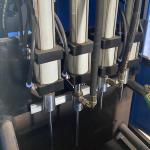 Semi-automatic 4 cavity PET bottle blow molding machine with DELTA PLC