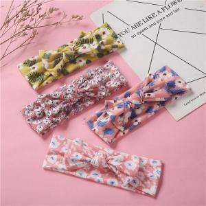 China Floral Stretch Knitted Cotton Bow Headband For Baby Boneless Super Soft Knotted Headwrap on sale