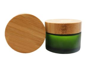 Wholesale 50ml Green Glass Ointment Jars Bamboo Lid Frosted Cream Jar Logo Customization from china suppliers