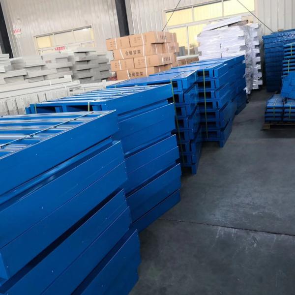 Metal pallets in industrial storage facility