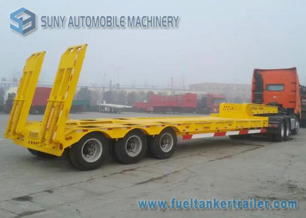 Quality 3 Axle 100 Ton Low Bed Semi Trailer Heavy Duty Flatbed Trailer With Manual Ramp for sale