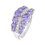 1.25 Carat 4 Prong Ovate Natural Tanzanite And Accent White CZ Sterling Silver