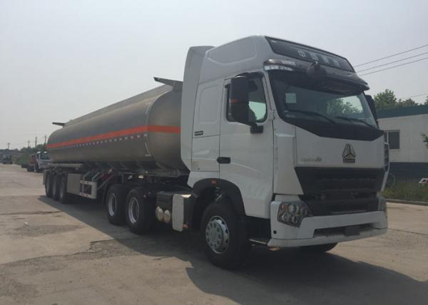 Quality HOWO A7 Fuel Oil Delivery Semi Truck With Trailer 60000 Liters 65000 kgs for sale