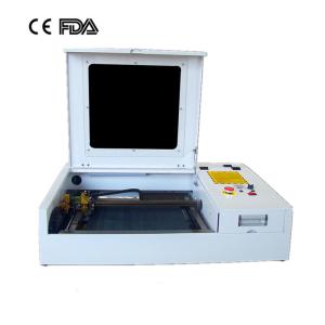 Wholesale 50w 4040 laser engraving cutting machine with CO2 laser tube and golden laser head from china suppliers