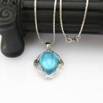 Sterling Silver Oval Dome Created Blue Topaz Cubic Zirconia Pendant Silver Chain