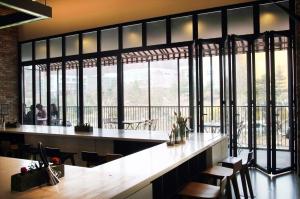 Wholesale Powder Coated Bi-fold Doors Energy Efficient And Durable Aluminium Folding Doors from china suppliers