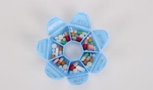 Wholesale One week 7 compartments round shaped plastic pill organizer, Travel plastic pill containers 7 compartment space planner from china suppliers
