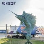 Interesting outdoor garden decoration with large bronze sailfish sculptures