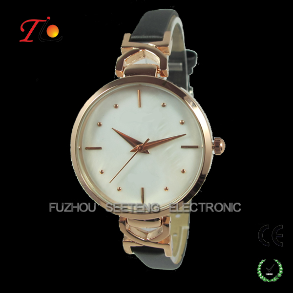 Beautiful thin gold color lady wrist watch with shell dial face