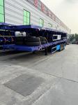 New China Manufacturer Of 4-axis Flatbed Semi-trailer Direct Sales Of 100 Ton