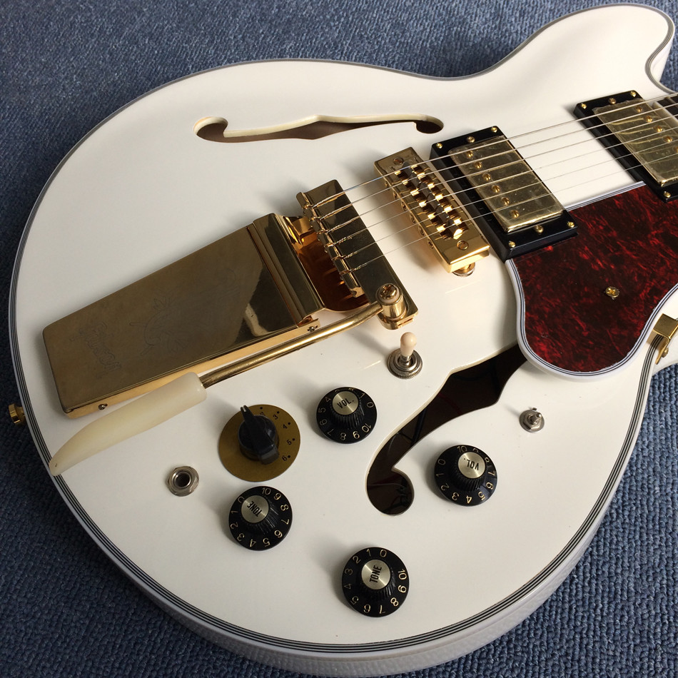 Hollow body jazz electric guitar, Double F holes,Ebony Fingerboard,Tremolo system,white guitar