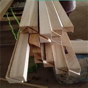 China 11mm x 11mm Wood Chamfer Paulownia Triangle Wood Strips with Moisture Content 8%-12% on sale