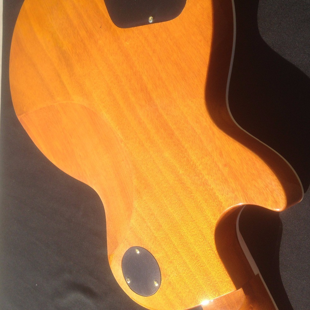 Standard LP electric guitar with gold hardware and flower inlay