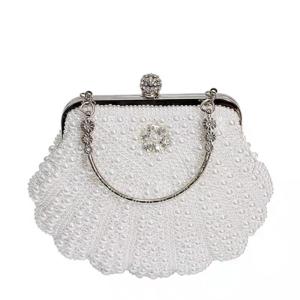 Wholesale White Shell Shape Pearl Hand Bags Hand Woven For Women 22cm length 18cm height from china suppliers