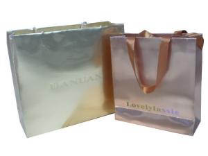 Wholesale Eco-friendly 200g Golden Paper Carrier Bag With Glued Ribbon Handle, Logo Stamped from china suppliers