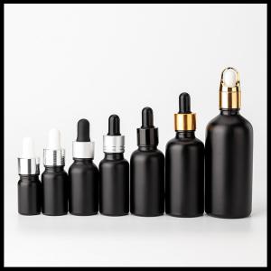 China Black Frosted Color Essential Oil Glass Bottles Cosmetic Packaging Round Shape on sale