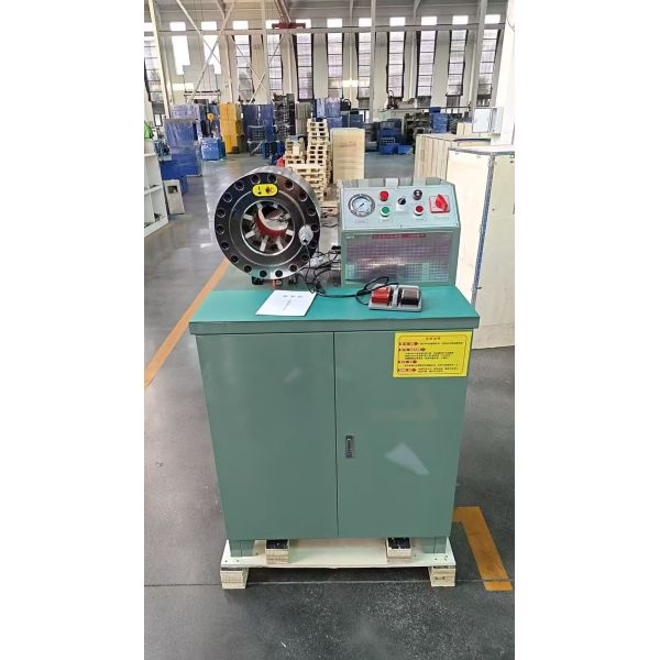 Hose crimping machine in workshop environment