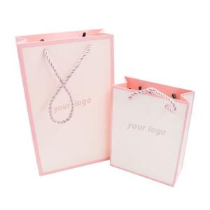 Wholesale Carry Custom Paper Shopping Bags 250g Embossed Promotional With Matched PP Rope Handle from china suppliers