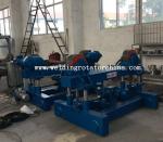 Up and down welding rotator