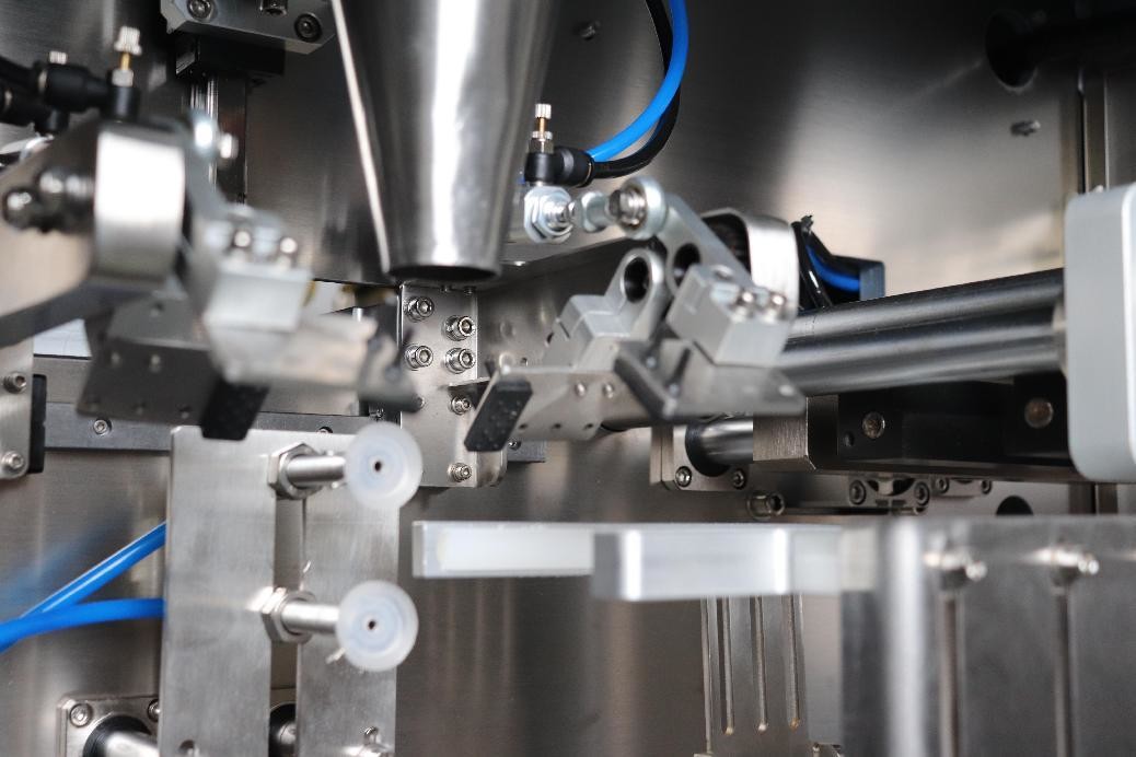 Automatic Small Premade Pouch Packing Machine For 3C Products Bucket Chain Filling Type