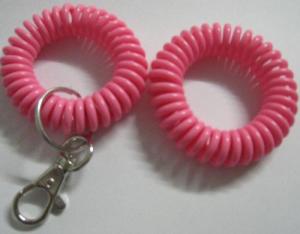 China Lovely solid pink color sprial wrist band coil key chain with split ring&thumb metal hook on sale