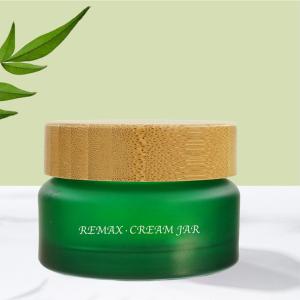 Wholesale 50g oval shape Green frosted Glass Bottle With bamboo Lid For Empty Cream Jar from china suppliers