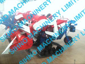 Wholesale 4L-0.7 mini paddy combine harvester with crawler from china suppliers