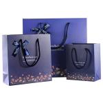 Durable ivory paper personalized shopping paper bag with logo