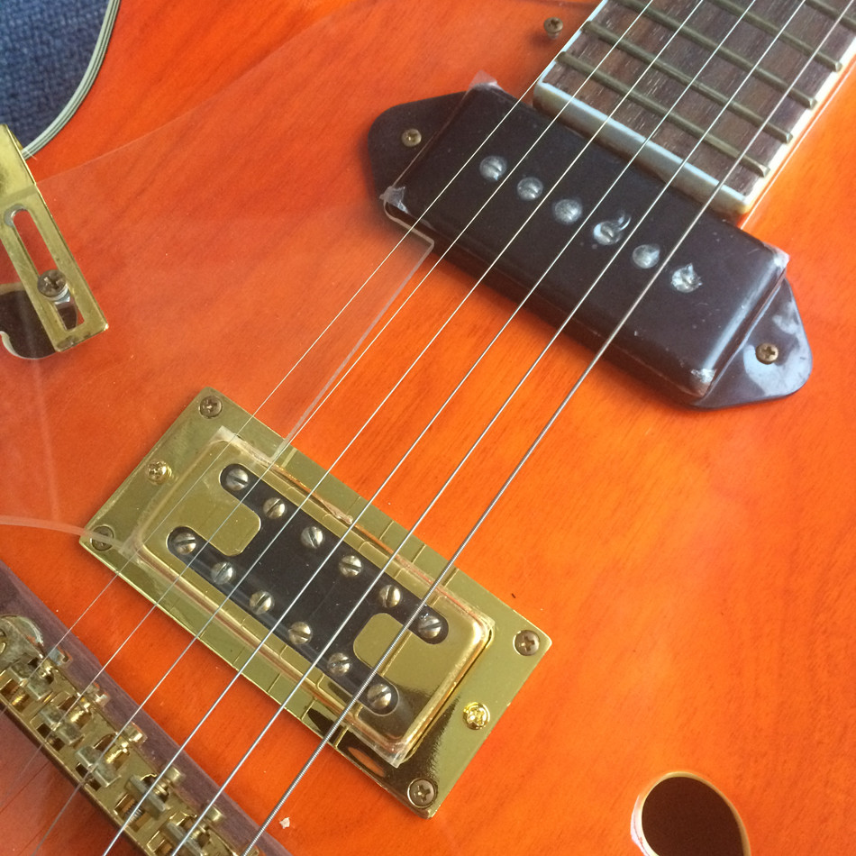 Hollow body jazz electric guitar, Double F holes,Ebony Fingerboard,Tremolo system,white guitar