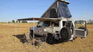 Wholesale Triangle Shaped Hard Shell Roof Top Tent Fireproof For Cars And Trucks from china suppliers