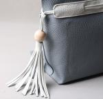 2016 summer new Korean fashion spell color tassel leather handbag drawstring