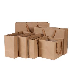 China Flat Handle Plain Brown Gift Bags Customized Logo Biodegradable Durable on sale